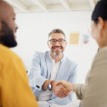 happy business people handshake and interview in m 6fpds75