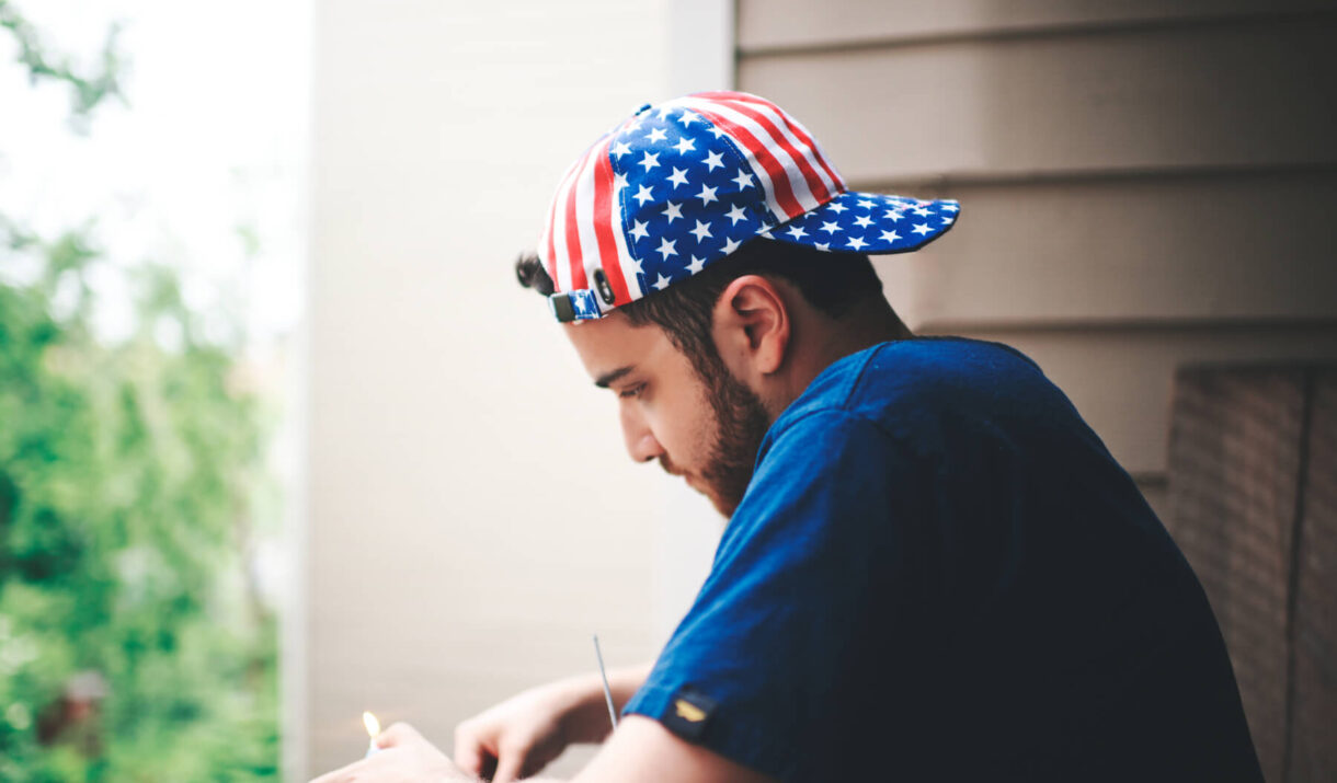 guy wearing american flag inspired hat 2024 12 01 06 30 36 utc